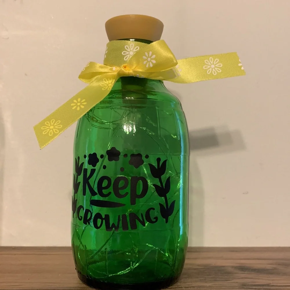 ‘Keep Growing’ green glass barrel solar lantern